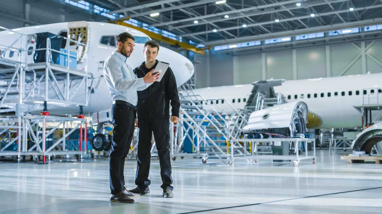 AS9100 vs ISO 9100 guide - aerospace plane frame inspection